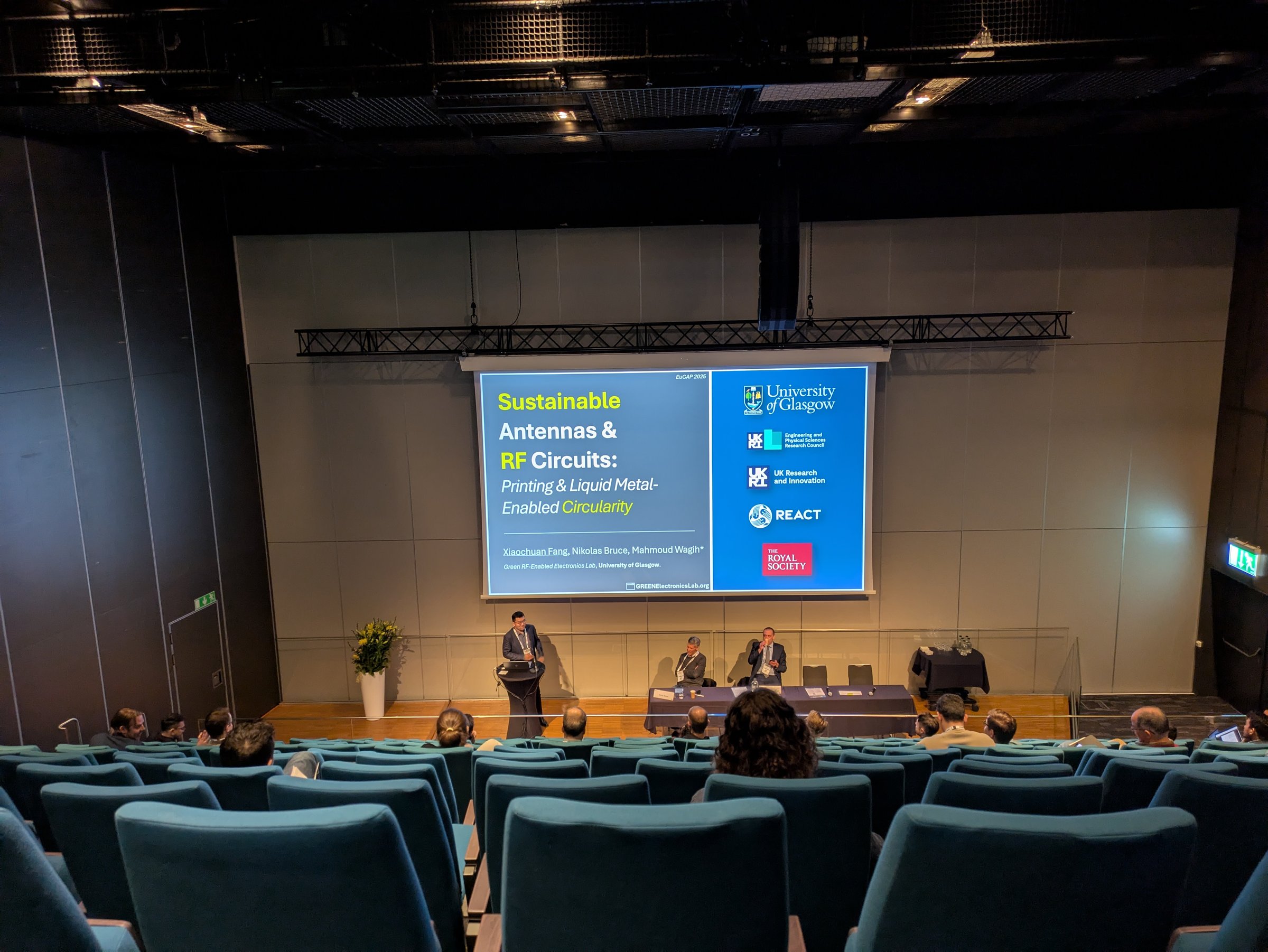 Researcher presenting at a conference
