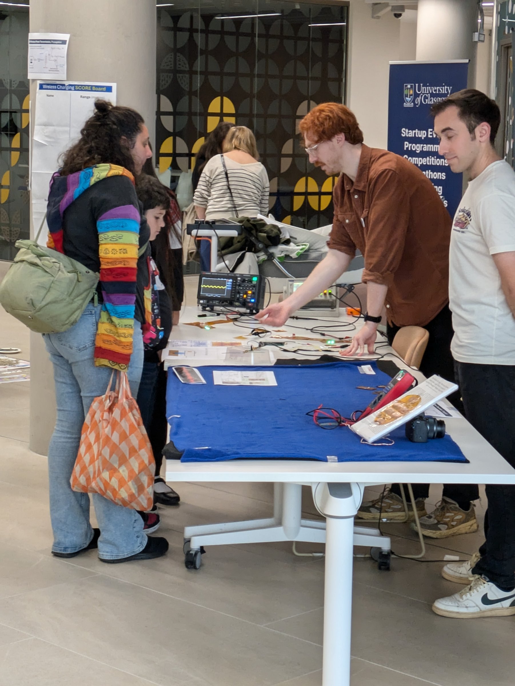 Lab members running a public outreach demo